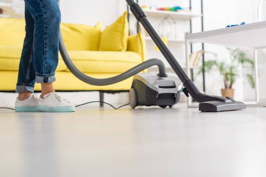 woman doing light chores after recovery